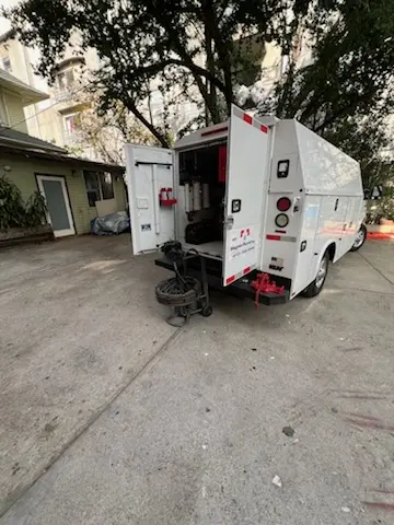 Magnet Plumbing service vehicle on-site for Water Heater Repair in Highland Park